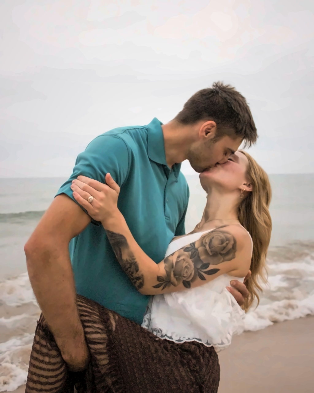 Couple beside the shoreline